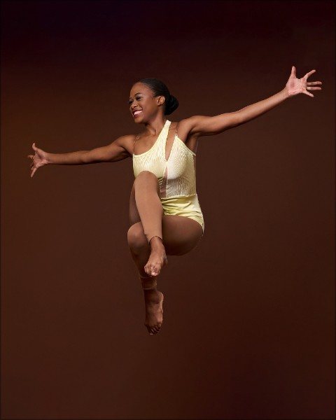 Amoni airborne jump yellow leotard joyful